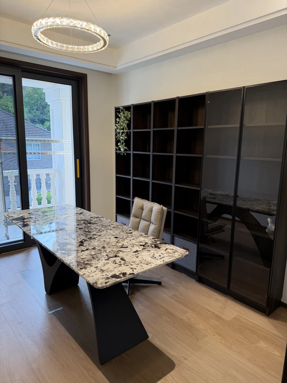 Stone worktable and storage arrangement in a home office