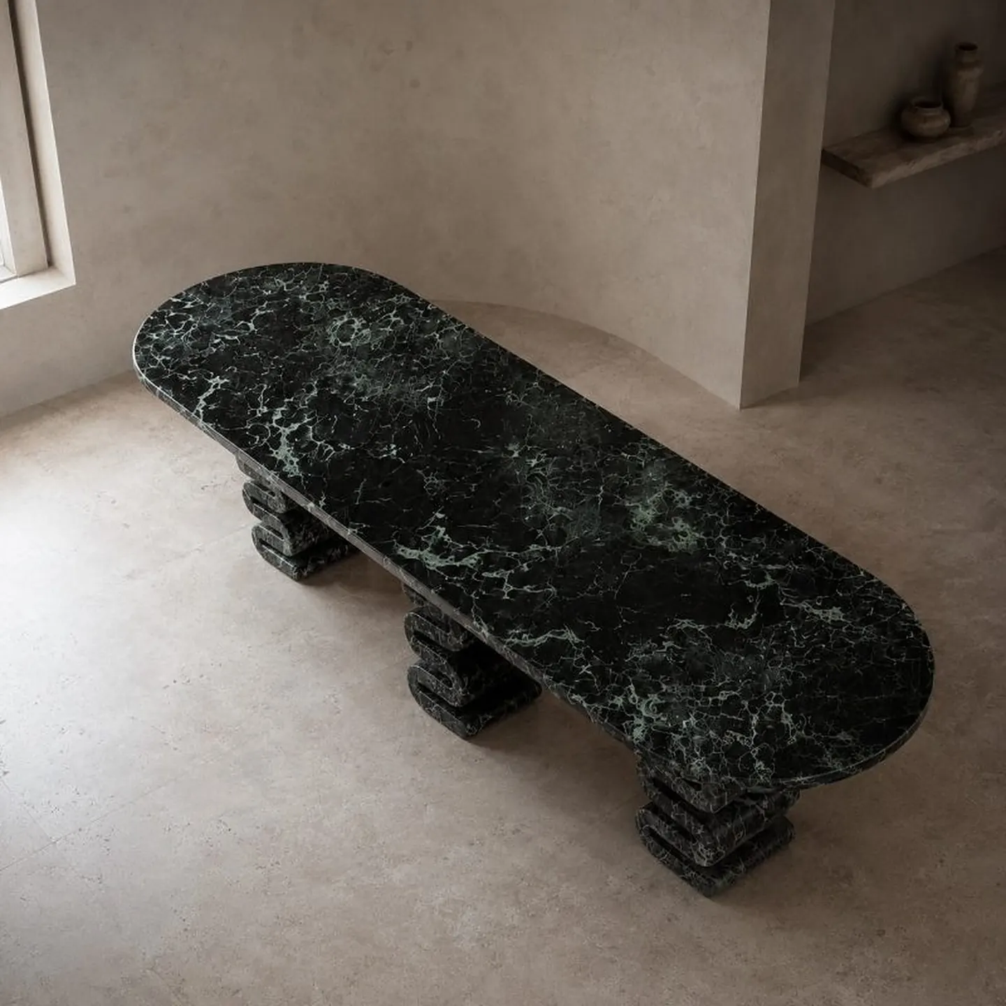 Verde Alpi table on three stacked pedestals